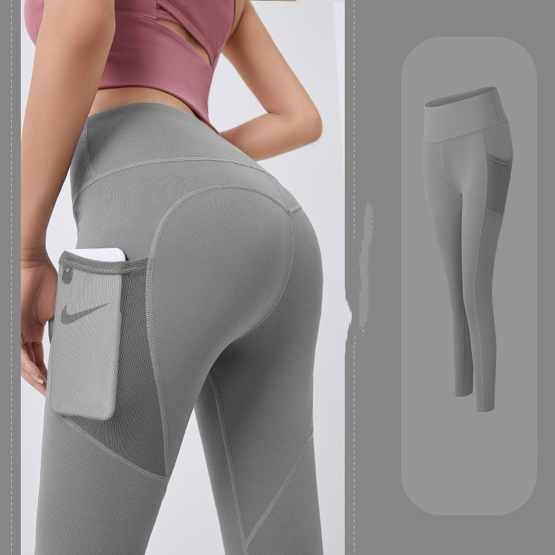 Thin fitness pants with mesh side pockets