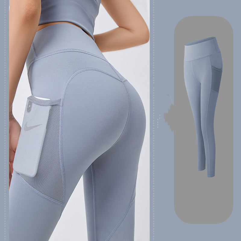 Thin fitness pants with mesh side pockets